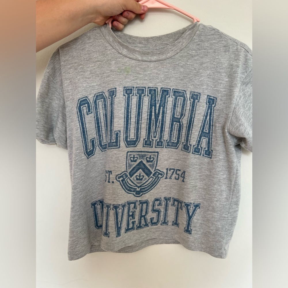 2 white and grey tops